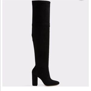Thigh high black boots